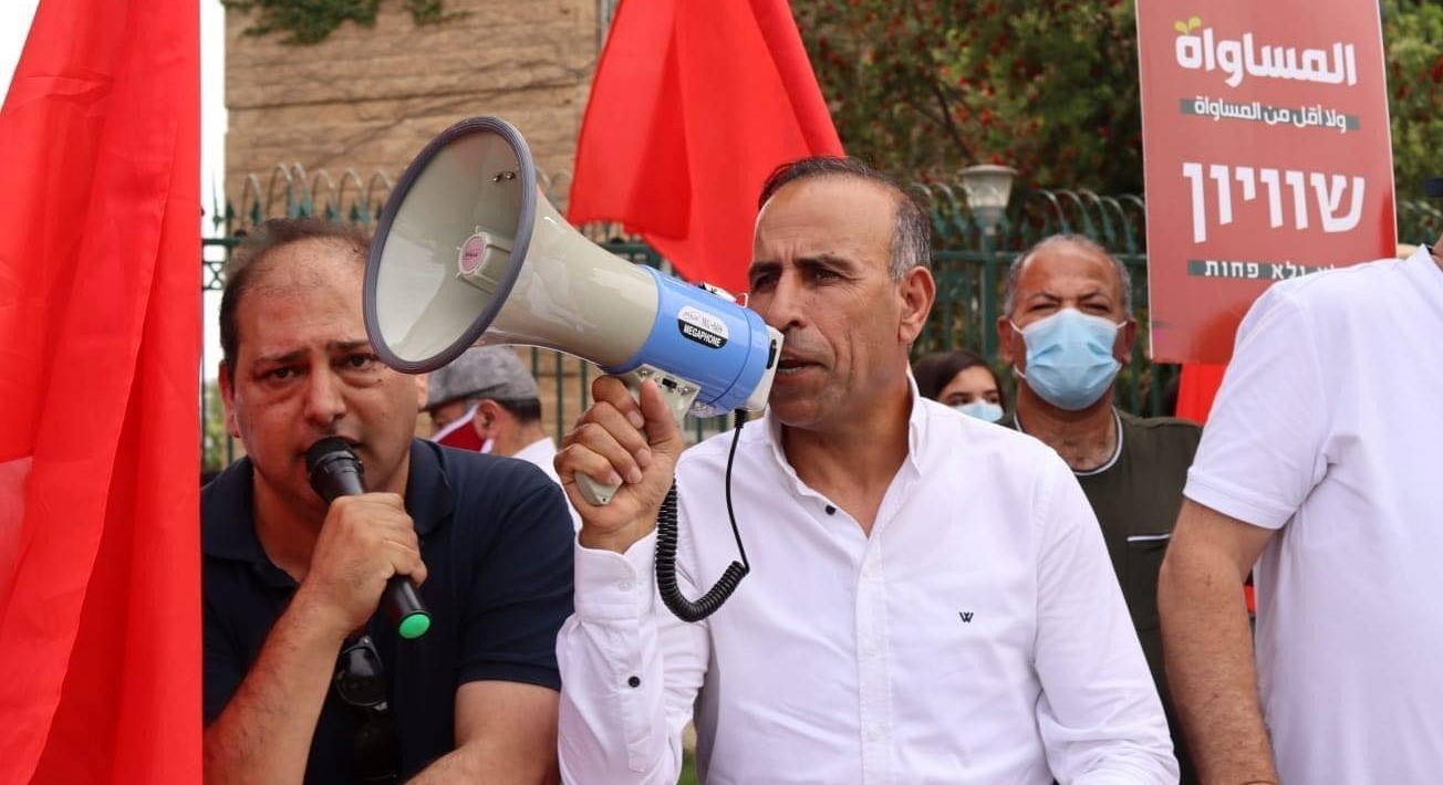 Hadash's Secretary General Mansour Dahamsheh, during a demonstration in front of the Knesset, Jerusalem, May 20, 2020: "There will be no Joint List with four parties. The negotiations are over." The placard in the background reads: "Equality and nothing less."