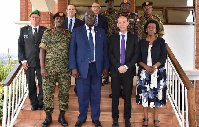 A delegation of Israel's Ministry of Defense, led by the head of the International Defense Cooperation Directorate (SIBAT) Brigadier General (ret.) Michel Ben-Baruch, (second from right in first row) during a visit to Uganda, May 2019