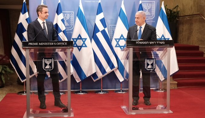 Greek PM Mitsotakis and Israeli PM Netanyahu speak at a press conference following their talks on Monday, February 8.