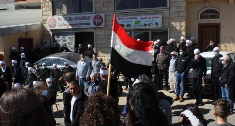 Arab-Druze citizens of Syria demonstrate against Israel’s occupation and annexation of the Golan Heights, Majdal Shams, Sunday, February 14, 2021.