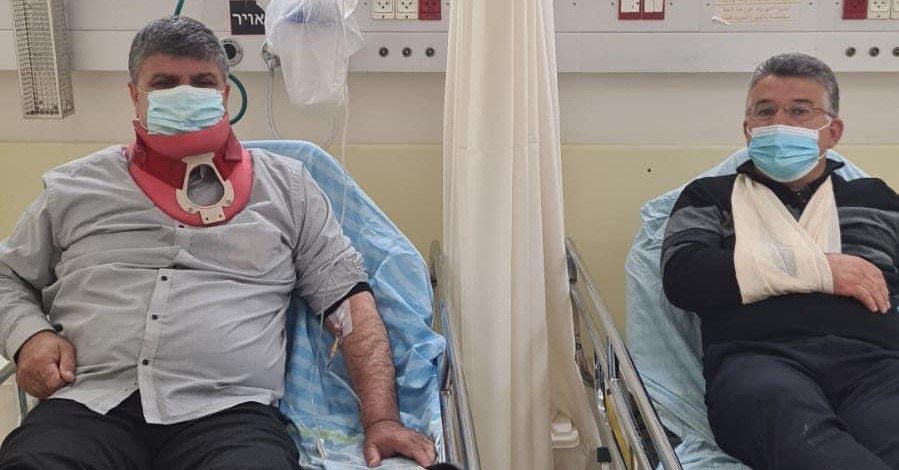 Umm al-Fahm Mayor Dr. Samir Mahamid, left, and Joint List MK Youssef Jabareen (Hadash) were among the dozens of demonstrators who received medical treatment in hospital after being injured by police during protests in Umm al-Fahm, Friday, February 26, 2021.