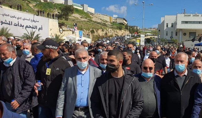 Among the thousands of protesters who took part in the Friday, March 4, rally in Umm al-Fahm were former Hadash MKs Mohammed Barakeh (first from right) the current head of the High Follow-Up Committee for Arab Citizens of Israel and Dr. Afo Agabria (second from right) presently the Chairman of Hadash.