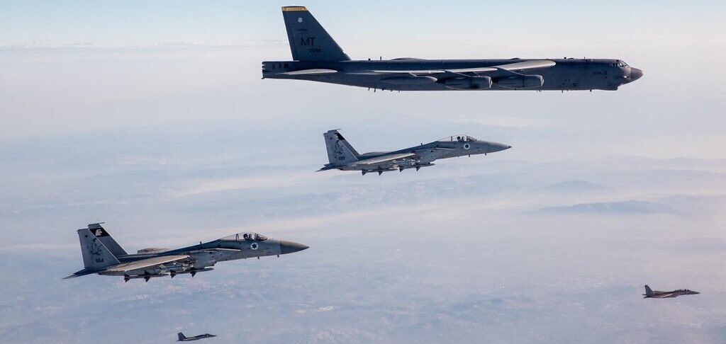 Israeli F-15 fighter jets escort an American B-52 bomber through Israeli airspace, Sunday, March 7, 2021.