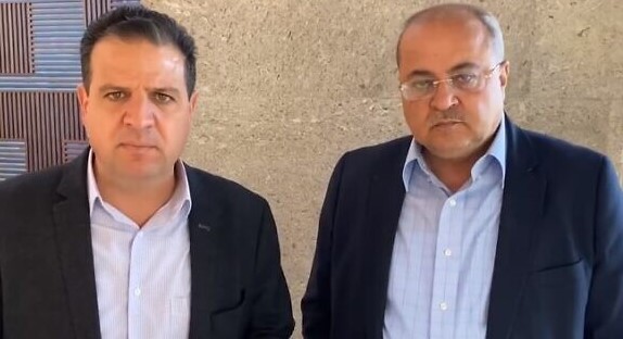 Joint List's Ayman Odeh (Hadash) and Ahmad Tibi (Ta'al)after their meeting with Yesh Atid leader Yair Lapid in Tel Aviv, April 1, 2021