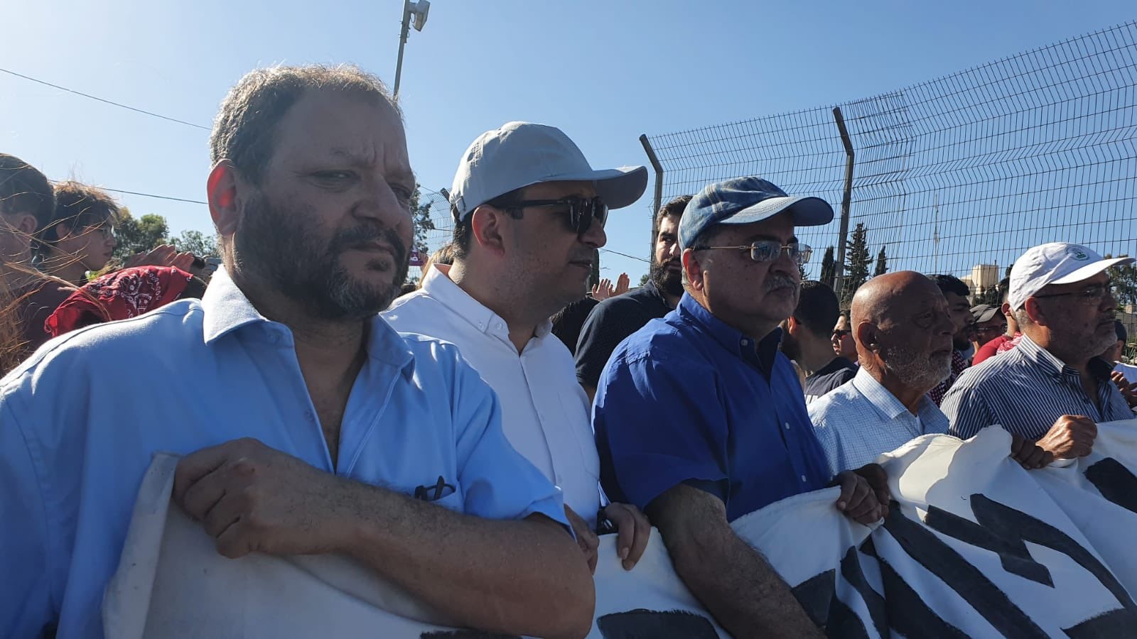 Three Joint List lawmakers participate in the Friday, May 7, demonstration in the Palestinian neighborhood of Sheikh Jarrah in occupied East Jerusalem. First from left to right they are MK Ofer Cassif (Hadash), Samy Abu Shahadeh (Balad) and Ahmad Tibi (Ta'al).
