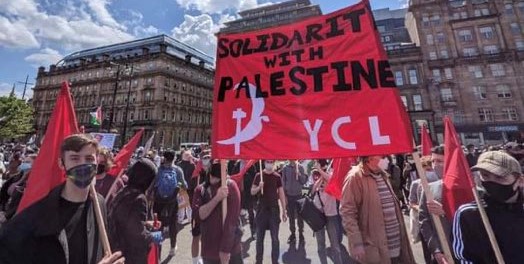 Young Communists in Britain demonstrate in solidarity with Palestine.