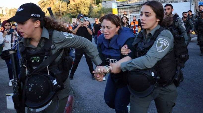 Israeli police detain Al-Jazeera reporter Givara Budeiri while she was covering the Sheikh Jarrah protests in occupied East Jerusalem, Saturday, June 5, 2021.