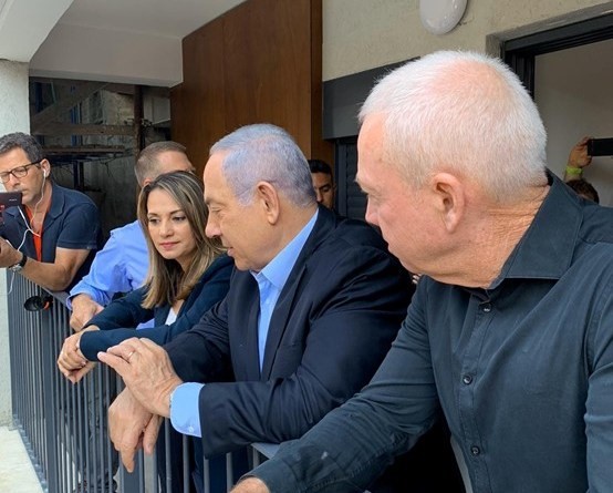 Israel's current Education Minister, Yifat Shasha-Biton, during her tenure as a Likud MK, confers with then-Prime Minister Benjamin Netanyahu and Education Minister Yoav Galant.