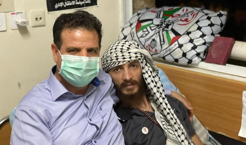 Joint List chair, MK Ayman Odeh (Hadash), visits the Palestinian administrative prisoner, Ghadanfar Abu Atwan, at Kaplan Hospital in Rehovot, last Thursday, July 8, 2021.