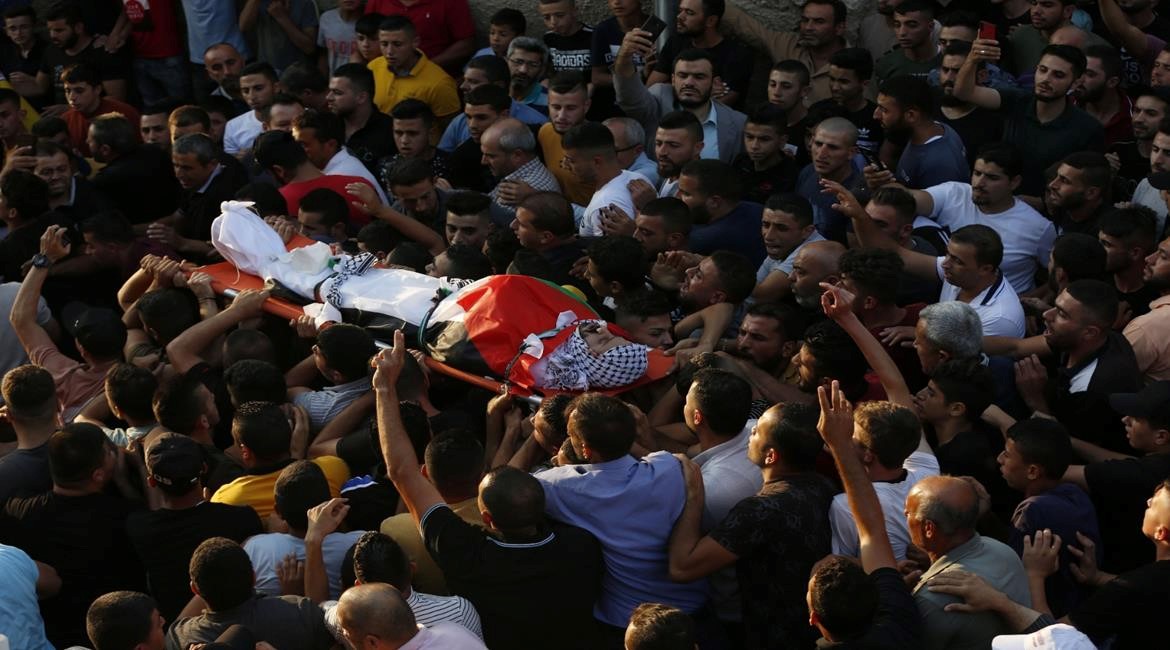 The mass funeral of 38-year-old Palestinian Imad Dweikat, a father of five from the village of Beita, Saturday, August 7, 2021