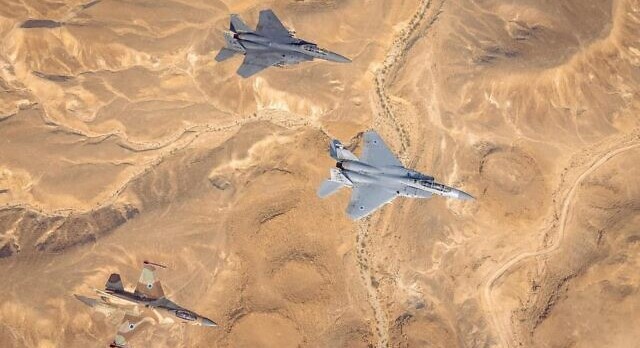 IAF and AFCENT F-15 and F-16 jets fly over southern Israel during the "Desert Eagle" drill, August 10, 2021.