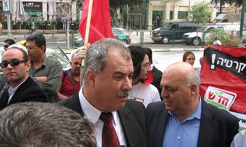 MK Barakeh with MK Afo Agbarieh during a demonstration held in Tel-Aviv (Photo: Hadash)