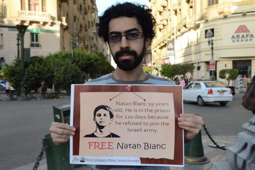 A group of young citizens protest in Cairo for the freedom of an Israeli citizen, Natan Blanc.  Peace activists protested at Talaat Harb square in Cairo, just a few meters from Tahrir Square. The Egyptian Conscientious Objectors Emad Dafrawi and Mohammed Fathi carried posters calling for the freedom of Blanc (Photo: Son of Ra)
