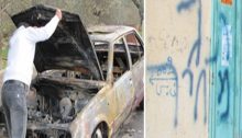 A Palestinian's car torched by settlers