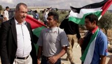 MK Barakeh during a demonstration against the occupation