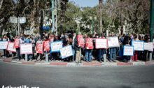 Demonstrators hold signs and call slogans against racism and police discrimination on racial basis, Jaffa, March 2, 2013. The demonstration was organized following a brutal attack on an Arab worker from Jaffa.