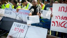 Eritrean refugees living in Israel take part in a protest outside the ministry of defense on October 18, 2012, in Tel Aviv. The protesters called for their recognition as refugees and for the immediate end of the Israeli governments' jailing policy (Photo: Activestills)