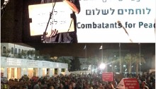 MK Dov Khenin speaks at an anti-war in Gaza demonstration in Jerusalem (Photo: Al Ittihad)