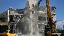 Eight homes in a four-storey block owned by the sons of Mohammed Hammad in Sur Baher, East Jerusalem, in the process of demolition.