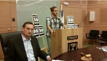 MK Dov Khenin (Hadash) during a debate held in the Knesset, last year, in support of legislation to increase the minimum wage to NIS 30 an hour, which comes to NIS 5,300 a month for full time employees.