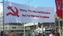 A banner in English, at the May Day March in Nazareth on Saturday, May 2