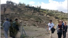Soldiers and tourists at Tel Sebastia, adjacent to the Palestinian village of Sebastia near Nablus