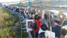 Demonstrators march along Route 60 near Beit Jala.