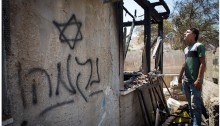 The Dawabsheh family home in the village of Duma after the settler arson attack on July 31, 2015. The Hebrew graffiti sprayed on the wall by the Jewish terrorists reads “Revenge!”