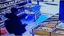 Security footage showing the suspected gunman in a grocery on Dizengoff Street in Tel Aviv, seconds before he stepped outside and opened fire with an automatic weapon, killing two people, on January 1, 2016.