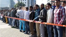Asylum seekers waiting for hours for renewing visa (or for summoning Sick ") outside the Interior Ministry office in Tel Aviv