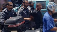 Police arrest the brother of Mahdi al-Saadi (second from right) on Thursday morning, August 3, in Jaffa.