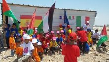 Children from Umm Jabal gather to protest the demolition of the only kindergarten there.