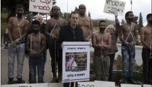 Hadash MK Dov Khenin, in a protest outside the Knesset to support the asylum seekers. He called Israel’s refugee policy inhumane and unacceptable.