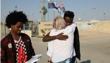 African asylum seekers and an Israeli activist outside of Saharonim Prison in the Negev after Israel released 207 asylum seekers incarcerated for refusing deportation after the government failed to reach any final deal for deporting them along with thousands of other Eritrean and Sudanese men, April 15, 2018. Prior to the release, Israel’s Supreme Court has issued temporary injunctions to give more time for petitioners to argue against the deportation plan.