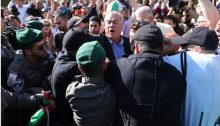 Israeli police accost the chairman of the High-Follow Up Committee for the Arab Citizens of Israel, former Hadash MK Muhammad Barakeh, during Monday’s protest in Jerusalem.
