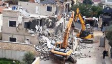 State deployed bulldozers demolish the three-story home that belonged to the Shaaban family in Lod.
