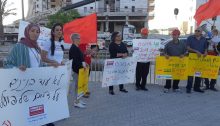 Hadash activists demonstrate at the site of the fatal accident in Yavne, Sunday, May 19, 2019.