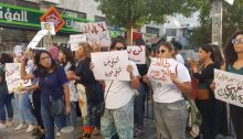 Palestinian women demonstrate against feminicide along Salah ad-Din Street in occupied East Jerusalem – The second sign from the right reads: "We're coming out because our spirit has given out"; and that in the center reads: "Let's build freedom, let's build a return."