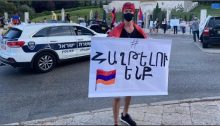 Ethic Armenian citizens of Israel demonstrate in Haifa, October 2, 2020, calling for a cease-fire in the fighting in Nagorno-Karabakh and an end Israel's arms sales to Azerbaijan. The placard implores "Don't abandon Armenia."