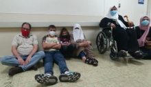 MK Ofer Cassif, left, and Maher al-Akhras’s family during their solidarity hunger strike outside the room where the Palestinian prisoner is being detained at the Kaplan Medical Center in Rehovot