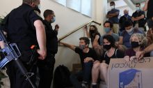 Peace activists blocked the main entrance of the JNF offices in Jerusalem in August 2020, to protest the pending eviction of members of the Palestinian family Sumarin from their home in Silwan, occupied East Jerusalem.