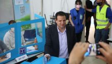 Joint List chair, MK Ayman Odeh, votes at his neighborhood polling station in Haifa on March 23, 2021 in the fourth Israeli election in two years.