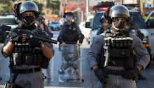 Israel's highly militarized police stand ready to confront protesters in the streets of Arab Jaffa, May 21, 2021.