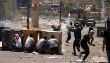 Palestinians clash with Israeli occupation forces during a protest in the West Bank village of Beita against a new Israeli settler outpost named Evyatar recently erected on Palestinian land on a mountain adjacent to the village, June 18, 2021.