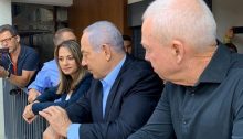 Israel's current Education Minister, Yifat Shasha-Biton, during her tenure as a Likud MK, confers with then-Prime Minister Benjamin Netanyahu and Education Minister Yoav Galant.