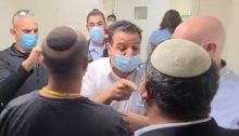 MK Ayman Odeh (Hadash, center) confronts racist MK Itamar Ben Gvir of the far-right Religious Zionist Party in a central Israel hospital on Tuesday, October 19.