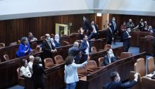 Joint List MKs celebrate in the plenum after the Sakhnin hospital bill passed its preliminary reading, Wednesday, November 10, 2021.